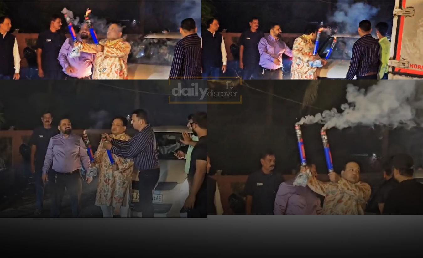 Viral video screenshot of a man bursting crackers on a busy public road in Surat